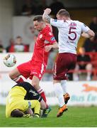 20 April 2018; Gavin Boyne of Shelbourne in action against Tadhg Ryan, left, and Stephen Walsh of Galway United during the SSE Airtricity League First Division match between Shelbourne FC and Galway United at Tolka Park in Dublin. Photo by Eoin Smith/Sportsfile