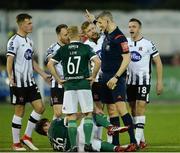 20 March 2018; Referee Ben Connolly surrounded by players from both sides after an incident during the SSE Airtricity League Premier Division match between Dundalk and Derry City at Oriel Park in Dundalk, Louth. Photo by Oliver McVeigh/Sportsfile