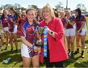 21 April 2018; Chellene Trill captain of Coláiste Bhaile Chláir, Claregalway is presented with the cup by President of the Ladies Gaelic Football Association Maire Hickey following the Lidl All Ireland Post Primary School Junior B Final match between St Brigids, S.S, Killarney and Coláiste Bhaile Chláir, Claregalway, Galway at Mick Neville Park in Rathkeale, Limerick. Photo by Matt Browne/Sportsfile
