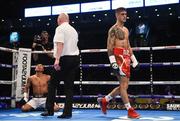 21 April 2018; Marco McCollough walks away after knocking down Arnoldo Solano during their super-featherweight bout at the Boxing in SSE Arena Belfast event in Belfast. Photo by David Fitzgerald/Sportsfile