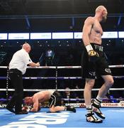 21 April 2018; Steven Ward walks away after knocking down Michal Ciach during their light-heavyweight bout at the Boxing in SSE Arena Belfast event in Belfast. Photo by David Fitzgerald/Sportsfile