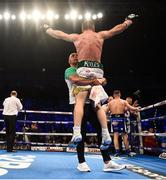 21 April 2018; Luke Keeler is lifted by trainer Pete Taylor following his WBO European Middleweight Championship bout against Conrad Cummings at the Boxing in SSE Arena Belfast event in Belfast. Photo by David Fitzgerald/Sportsfile