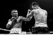 21 April 2018; (EDITORS NOTE: Image has been converted to black & white) Carl Frampton, left, in action against Nonito Donaire during their Vacant WBO Interim World Featherweight Championship bout at the Boxing in SSE Arena Belfast event in Belfast. Photo by David Fitzgerald/Sportsfile