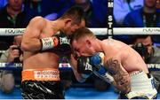 21 April 2018; Nonito Donaire, left, in action against Carl Frampton during their Vacant WBO Interim World Featherweight Championship bout at the SSE Arena in Belfast. Photo by Ramsey Cardy/Sportsfile