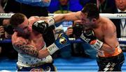 21 April 2018; Nonito Donaire, right, in action against Carl Frampton during their Vacant WBO Interim World Featherweight Championship bout at the SSE Arena in Belfast. Photo by Ramsey Cardy/Sportsfile