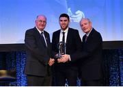 21 April 2018; Luke Connolly of Nemo Rangers is presented with his award by Uachtarán Chumann Lúthchleas Gael John Horan and Denis O'Callaghan, Head of AIB Retail Banking at the AIB GAA Club Player Awards at Croke Park in Dublin. Photo by Eóin Noonan/Sportsfile