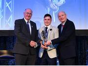21 April 2018; Dylan Wall of Corofin is presented with his award by Uachtarán Chumann Lúthchleas Gael John Horan and Denis O'Callaghan, Head of AIB Retail Banking at the AIB GAA Club Player Awards at Croke Park in Dublin. Photo by Eóin Noonan/Sportsfile