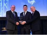 21 April 2018; Alan O’Donovan of Nemo Rangers is presented with his award by Uachtarán Chumann Lúthchleas Gael John Horan and Denis O'Callaghan, Head of AIB Retail Banking at the AIB GAA Club Player Awards at Croke Park in Dublin. Photo by Eóin Noonan/Sportsfile