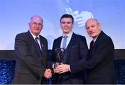 21 April 2018; Ronan Lynch of Na Piarsaigh is presented with his award by Uachtarán Chumann Lúthchleas Gael John Horan and Denis O'Callaghan, Head of AIB Retail Banking at the AIB GAA Club Player Awards at Croke Park in Dublin. Photo by Eóin Noonan/Sportsfile