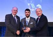 21 April 2018; Cathall King of Na Piarsaigh is presented with his award by Uachtarán Chumann Lúthchleas Gael John Horan and Denis O'Callaghan, Head of AIB Retail Banking at the AIB GAA Club Player Awards at Croke Park in Dublin. Photo by Eóin Noonan/Sportsfile
