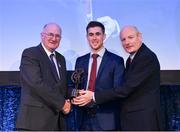 21 April 2018; Sean Moran of Cuala is presented with his award by Uachtarán Chumann Lúthchleas Gael John Horan and Denis O'Callaghan, Head of AIB Retail Banking at the AIB GAA Club Player Awards at Croke Park in Dublin. Photo by Eóin Noonan/Sportsfile