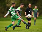 22 April 2018; Ciaran Bissett of Dublin Bus in action against Michael Mcloughlin of Firhouse Clover during the Irish Daily Mail FAI Senior Cup Qualifying Round match between Dublin Bus and Firhouse Clover at Coldcut Park in Palmerstown, Dublin. Photo by Eóin Noonan/Sportsfile