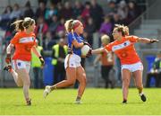 22 April 2018; Orla O'Dwyer of Tipperary in action against Fionnuala McKenna, left, and Sharon Reel of Armagh during the Lidl Ladies Football National League Division 2 semi-final match between Tipperary and Armagh at Coralstown Kinnegad GAA in Kinnegad, Westmeath. Photo by Piaras Ó Mídheach/Sportsfile