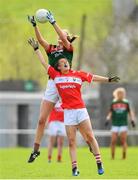 22 April 2018; Clodagh McManamon of Mayo in action against Emma Spillane of Cork during the Lidl Ladies Football National League Division 1 semi-final match between Cork and Mayo at St Brendan's Park in Birr, Offaly. Photo by Ramsey Cardy/Sportsfile