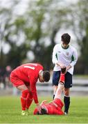 22 April 2018; Dean McCarthy of Cork Youth League is streched by Tommy Forde of Mayo Schoolboys & Youths Association Football League during the FAI Youth Interleague Cup Final match between Mayo Schoolboys & Youths Association Football League and Cork Youth League at Milebush Park in Castlebar, Mayo. Photo by Harry Murphy/Sportsfile