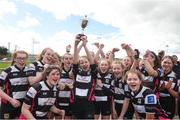 22 April 2018; Dundalk captain, Caoimhe O'Callaghan, lifts the cup as her team-mates celebrate after the U16 Shield match between Dundalk and Portarlington at Navan RFC in Meath. Photo by Matt Browne/Sportsfile