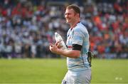 22 April 2018; Donnacha Ryan of Racing 92 smiles after being thrown a sliothar by the Munster fans after the European Rugby Champions Cup semi-final match between Racing 92 and Munster Rugby at the Stade Chaban-Delmas in Bordeaux, France. Photo by Brendan Moran/Sportsfile