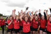 22 April 2018; Aoife Dalton captain of Tullamore lifts the cup as her team-mates celebrate after the U16 Plate match between New Ross and Tullamore at Navan RFC in Meath. Photo by Matt Browne/Sportsfile