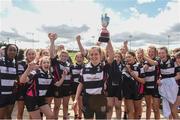 22 April 2018; Orlagh Conway captain of Dundalk lifts the cup as her team-mates celebrate after the 18s Shield match between Dundalk and MU Barnhall at Navan RFC in Meath. Photo by Matt Browne/Sportsfile   Photo by Matt Browne/Sportsfile
