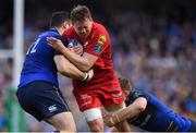21 April 2018; James Davies of Scarlets is tackled by Robbie Henshaw and Garry Ringrose of Leinster during the European Rugby Champions Cup Semi-Final match between Leinster Rugby and Scarlets at the Aviva Stadium in Dublin. Photo by Brendan Moran/Sportsfile
