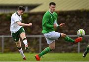 24 April 2018; Pierce Phillips of  Ireland - College & Universities shoots under pressure from Lee Delaney of Irish Defence Forces during the College & Universities Friendly match between Irish Defence Forces and Ireland at Collins Barracks in Cork. Photo by Harry Murphy/Sportsfile