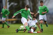 24 April 2018; Eric O'Halloran of Irish Defence Forces in action against Carlton Ubaezuonu of Ireland - College & Universities during the College & Universities Friendly match between Irish Defence Forces and Ireland at Collins Barracks in Cork. Photo by Harry Murphy/Sportsfile