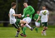 24 April 2018; Ross Taheny of Ireland - College & Universities in action against Jamie Murphy of Irish Defence Forces during the College & Universities Friendly match between Irish Defence Forces and Ireland at Collins Barracks in Cork. Photo by Harry Murphy/Sportsfile
