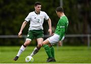 24 April 2018; Pierce Phillips of Ireland - College & Universities in action against Adrian Friel of Irish Defence Forces during the College & Universities Friendly match between Irish Defence Forces and Ireland at Collins Barracks in Cork. Photo by Harry Murphy/Sportsfile