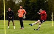 24 April 2018; Keith Earls has a kick at goal as team-mates Simon Zebo and Conor Murray look on during Munster Rugby squad training at the University of Limerick in Limerick. Photo by Diarmuid Greene/Sportsfile