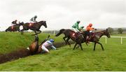 24 April 2018; Enniskillen, with Benny Walsh up, fall, as eventual winner Just Wait And See, 4, with Billy Gleeson up, and Lighting Tunes with Nile O'Rourke up, jump 'Ruby's Double' during The Kildare Hunt Club Fr Sean Breen Memorial Steeplechase for the Ladies Perpetual Cup at Punchestown Racecourse in Naas, Co. Kildare. Photo by Matt Browne/Sportsfile