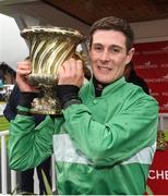 24 April 2018; Jockey Billy Gleeson with the cup after winning The Kildare Hunt Club Fr Sean Breen Memorial Steeplechase for the Ladies Perpetual Cup on Just Wait And See at Punchestown Racecourse in Naas, Co. Kildare. Photo by Matt Browne/Sportsfile