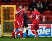 24 April 2018; Cian Kavanagh of Shelbourne celebrates with team-mate Dylan Grimes after scoring his side's third goal during the EA SPORTS Cup Second Round match between Shelbourne and Drogheda United at Tolka Park in Dublin. Photo by Eóin Noonan/Sportsfile