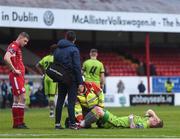24 April 2018; Lloyd Buckley of Drogheda United is treated by medical staff during the EA SPORTS Cup Second Round match between Shelbourne and Drogheda United at Tolka Park in Dublin. Photo by Eóin Noonan/Sportsfile