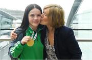 26 April 2018; Daina Moorhouse of Ireland poses with her Gold Medal and her Grandmother, Margret Fitzpatrick, in attendance during Team Ireland homecoming at Dublin Airport. Photo by Harry Murphy/Sportsfile
