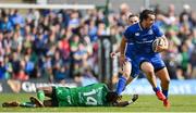 28 April 2018; James Lowe of Leinster skips the tackle by Niyi Adeolokun of Connacht during the Guinness PRO14 Round 21 match between Connacht and Leinster at the Sportsground in Galway. Photo by Ramsey Cardy/Sportsfile