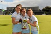 28 April 2018; UCD players, from left, Deirdre Duke, Katie Mullan, and Sarah Robinson celebrate with the cup after the Women's EY Hockey League match between UCD and Monkstown at UCD in Belfield, Dublin. Photo by Piaras Ó Mídheach/Sportsfile