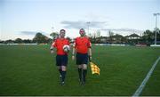 28 April 2018; Referee Eoin O'Shea, left, and assistant referee Alan Dunne leave the pitch with the match ball after the match was abandoned due to floodlight failure during the SSE Airtricity League First Division match between Cabinteely and Athlone Town at Cabinteely FC in Blackrock, Co. Dublin. Photo by David Fitzgerald/Sportsfile