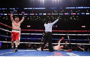 28 April 2018; Nikolay Buzolin celebrates knocking out Lawrence Gleeson during their super lightweight bout at the Barclays Center in Brooklyn, New York. Photo by Stephen McCarthy/Sportsfile