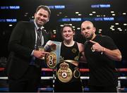 28 April 2018; Katie Taylor celebrates with promoter Eddie Hearn, left, and trainer Ross Enamait, right, following her WBA and IBF World Lightweight unification bout with Victoria Bustos at the Barclays Center in Brooklyn, New York. Photo by Stephen McCarthy/Sportsfile