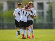 29 April 2018; Darragh Wall of Tramore AFC congratulates team-mate Daniel Olasumbo, 11, after he scored his side's first goal during the FAI Youth Cup Final match between Tramore AFC and St Kevin's Boys at Ozier Park in Waterford. Photo by Piaras Ó Mídheach/Sportsfile