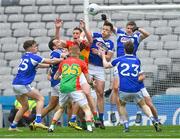 31 March 2018; Laois and Carlow players contest possession late in the game during the Allianz Football League Division 4 Final match between Carlow and Laois at Croke Park in Dublin. Photo by Piaras Ó Mídheach/Sportsfile