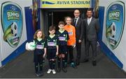 1 May 2018; Republic of Ireland manager Martin O'Neill and Republic of Ireland Women's head coach Colin Bell pictured with local soccer players, from left, Caoimhe McKane, age 6, Dylan Murray, age 7, Cameron Egan-Tormey, age 11, and Katie Keane, age 11, at the SportsDirect FAI Summer Soccer Schools launch at the Aviva Stadium in Dublin. Photo by David Fitzgerald/Sportsfile