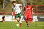 5 April 2018; James Boyle of Ireland, left, in action against Bartosz Lastowski of Poland during the Citywest Hotel EAFF Amputee Football Weeks Tournament match between Ireland and Poland at Dalymount Park in Dublin. Photo by Barry Cregg/Sportsfile