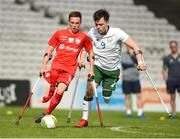 5 April 2018; Krystian Kaplon, centre, of Poland in action against James Boyle, right, of Ireland during the Citywest Hotel EAFF Amputee Football Weeks Tournament match between Ireland and Poland at Dalymount Park in Dublin. Photo by Barry Cregg/Sportsfile
