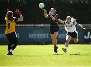 6 May 2018; Mairéad Morrissey of Tipperary scores a point despite a tackle from Laura Fitzpatrick of Cavan during the Lidl Ladies Football National League Division 2 Final match between Cavan and Tipperary at Parnell Park in Dublin. Photo by Tom Beary/Sportsfile