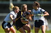 6 May 2018; Aisling McCarthy of Tipperary in action against Laura Fitzpatrick, left, and Neasa Byrd of Cavan during the Lidl Ladies Football National League Division 2 Final match between Cavan and Tipperary at Parnell Park in Dublin. Photo by Piaras Ó Mídheach/Sportsfile