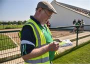 6 May 2018; Steward Tom Galvin ammends his team sheet prior to the Connacht GAA Football Senior Championship Quarter-Final match between London and Sligo at McGovern Park in Ruislip, London, England. Photo by Harry Murphy/Sportsfile