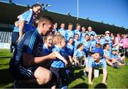 6 May 2018; Young Dublin supporter Ollie Kearney,  age 1, celebrates with the Dublin team after the Lidl Ladies Football National League Division 1 Final match between Dublin and Mayo at Parnell Park in Dublin. Photo by Tom Beary/Sportsfile