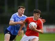 7 May 2018; Ryan Walsh of Louth in action against Adam Fearon of Dublin during the Electric Ireland Leinster GAA Football Minor Championship Round 1 match between Dublin and Louth at Parnell Park in Dublin. Photo by Seb Daly/Sportsfile