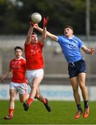 7 May 2018; Ruairi Hanlon of Louth in action against Eoin Adamson of Dublin during the Electric Ireland Leinster GAA Football Minor Championship Round 1 match between Dublin and Louth at Parnell Park in Dublin. Photo by Seb Daly/Sportsfile